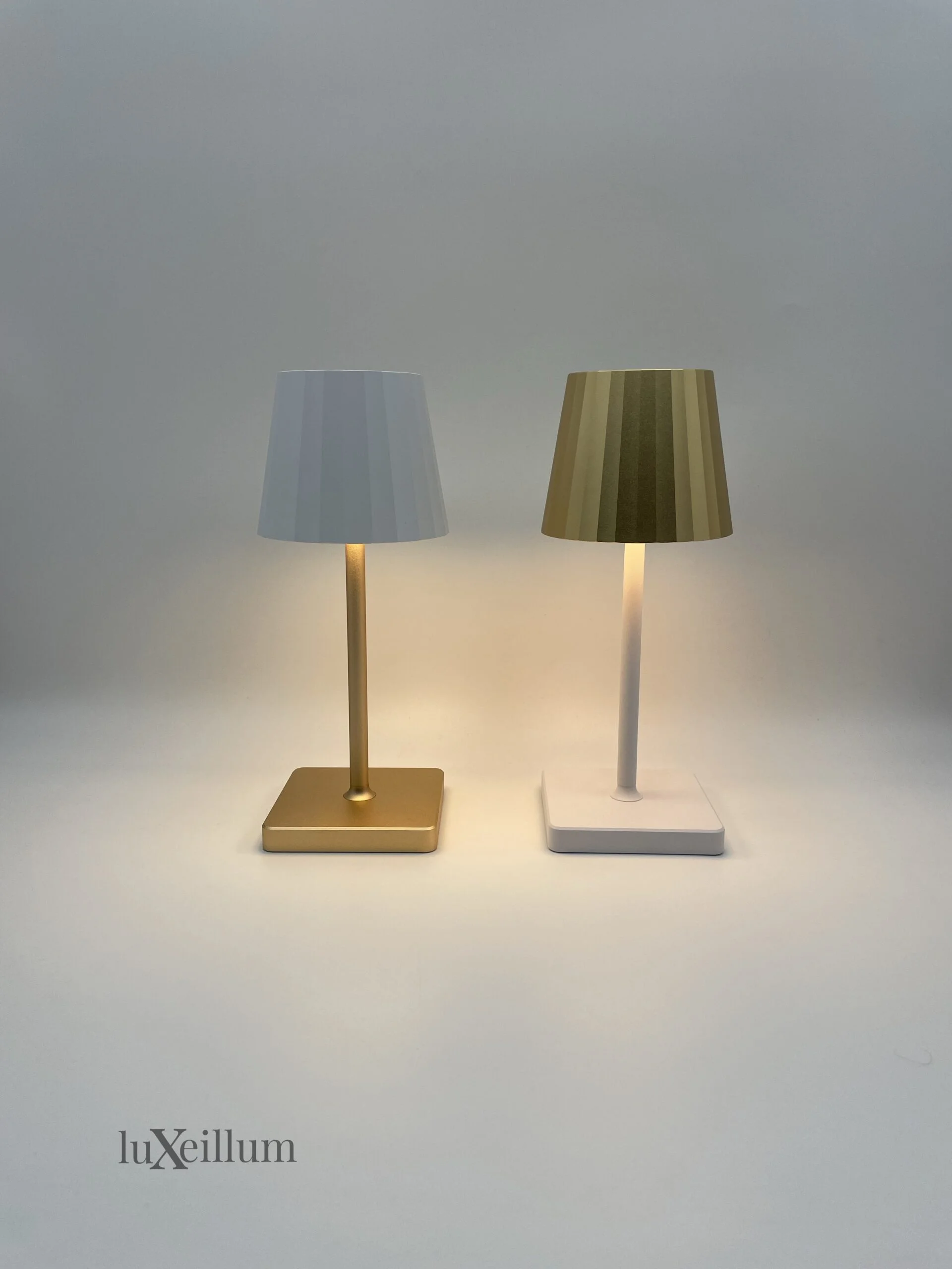 Slim-profile black cordless lamp providing soft dining illumination