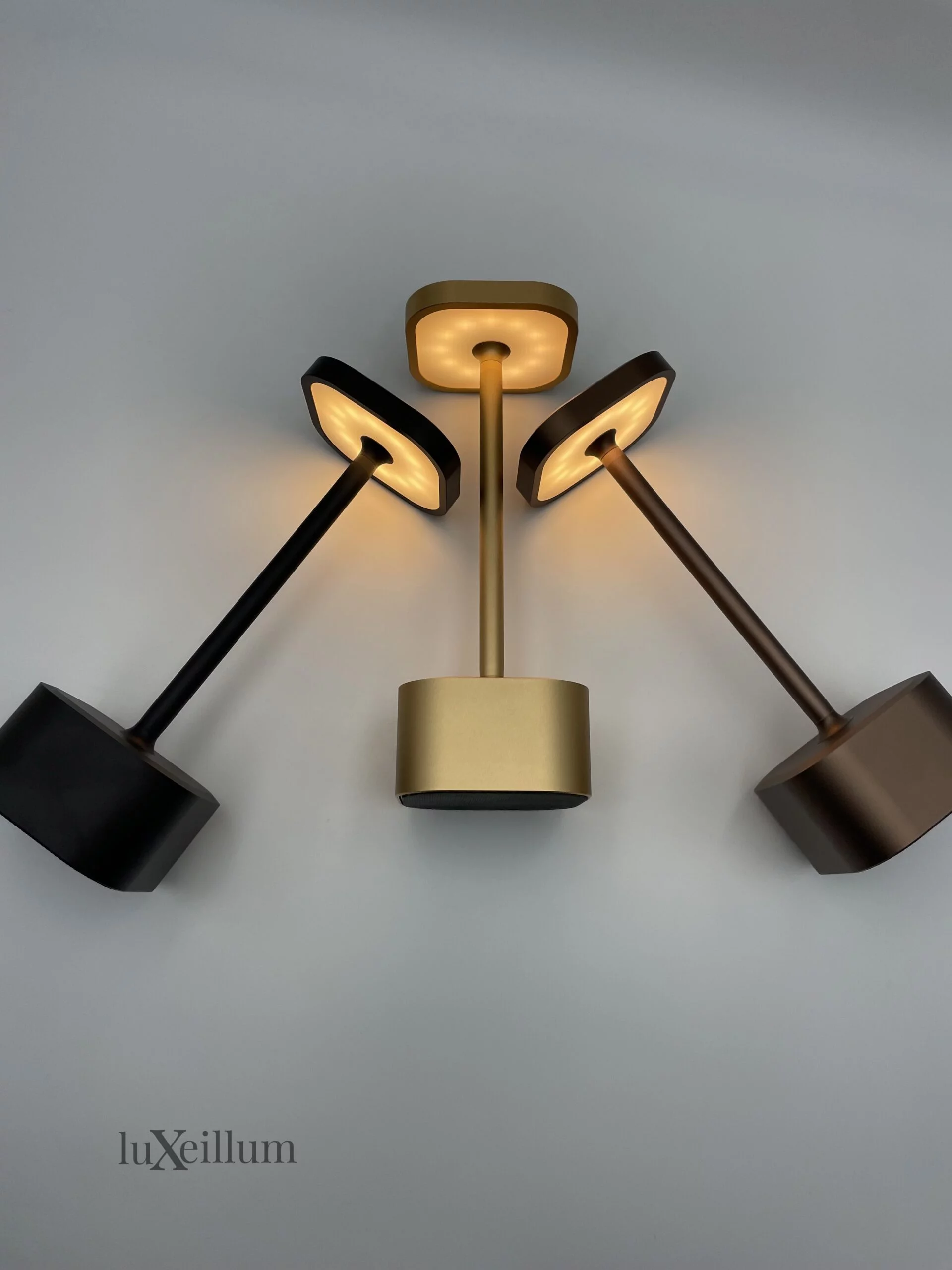 Bronze and gold cordless lamps providing atmospheric dining lighting