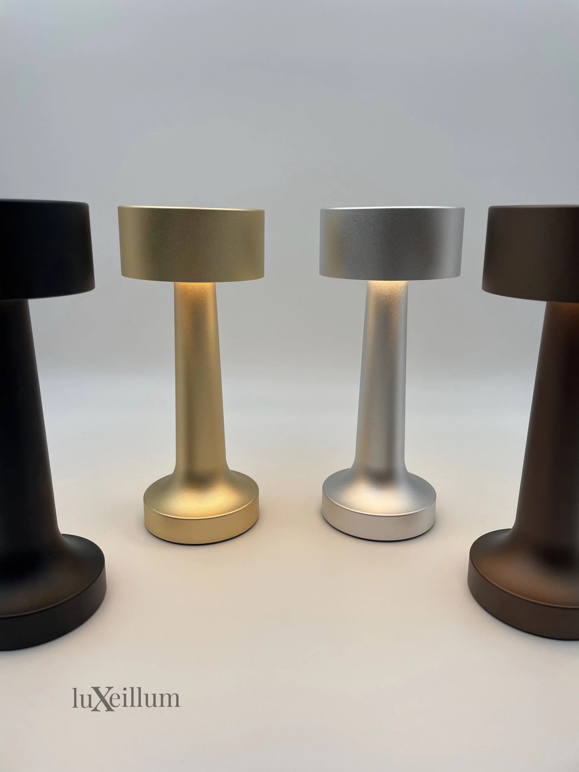 Outdoor restaurant dining setup with waterproof cordless lamps