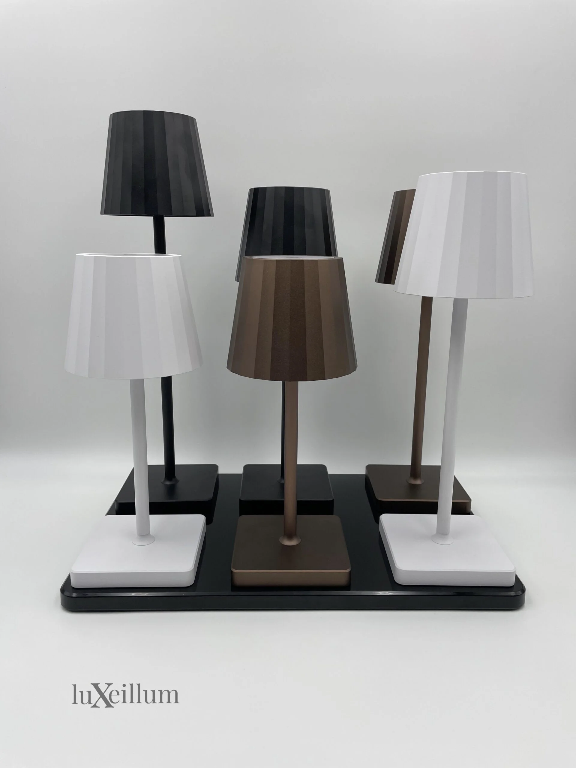 Dining terrace at sunset lit with Luxeillum cordless lighting